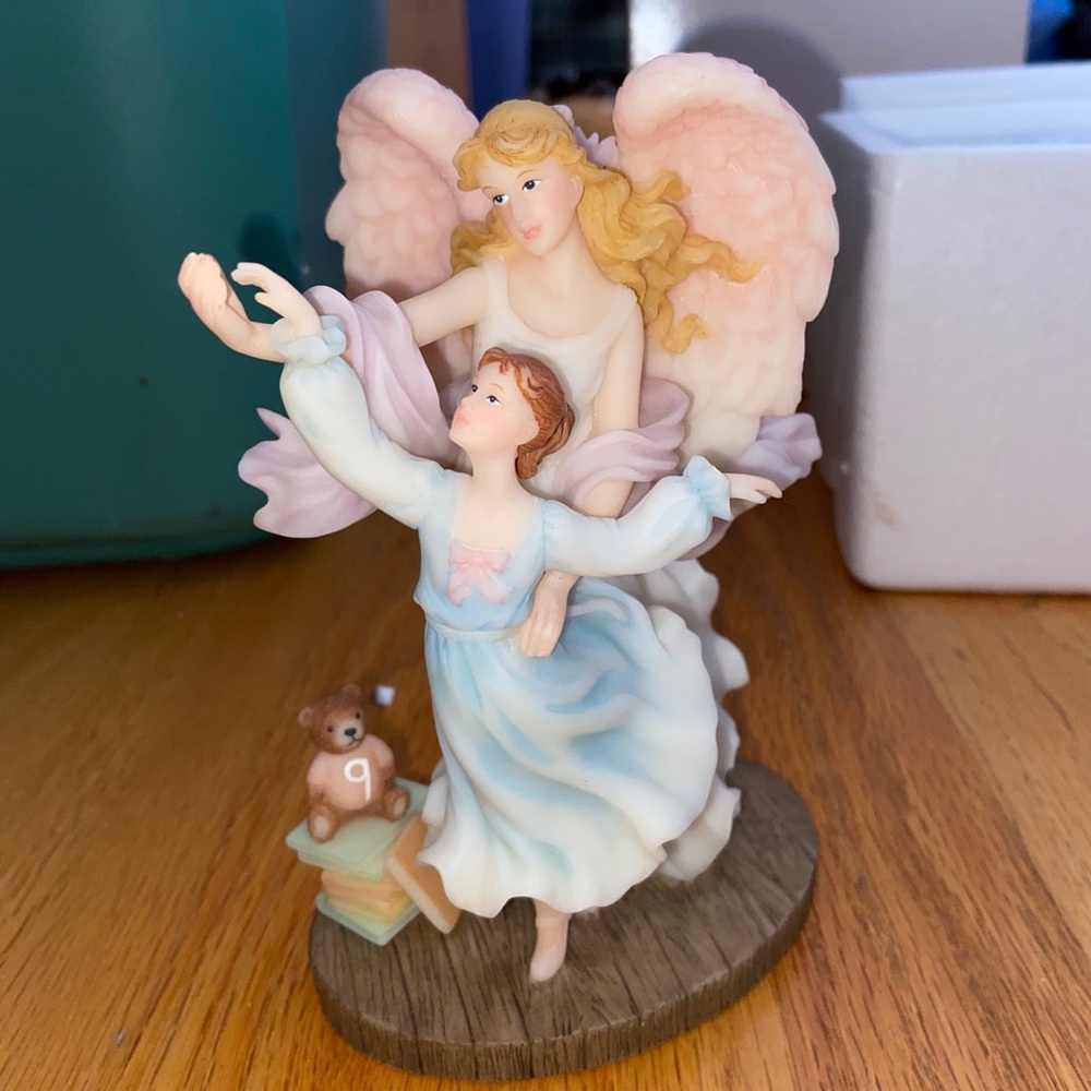 Angel and Child Statue
